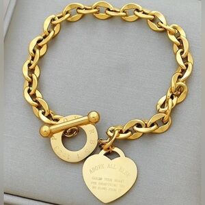 Gold Plated Stainless Steel Fashion Heart Tag Toggle Bracelet. NWT.